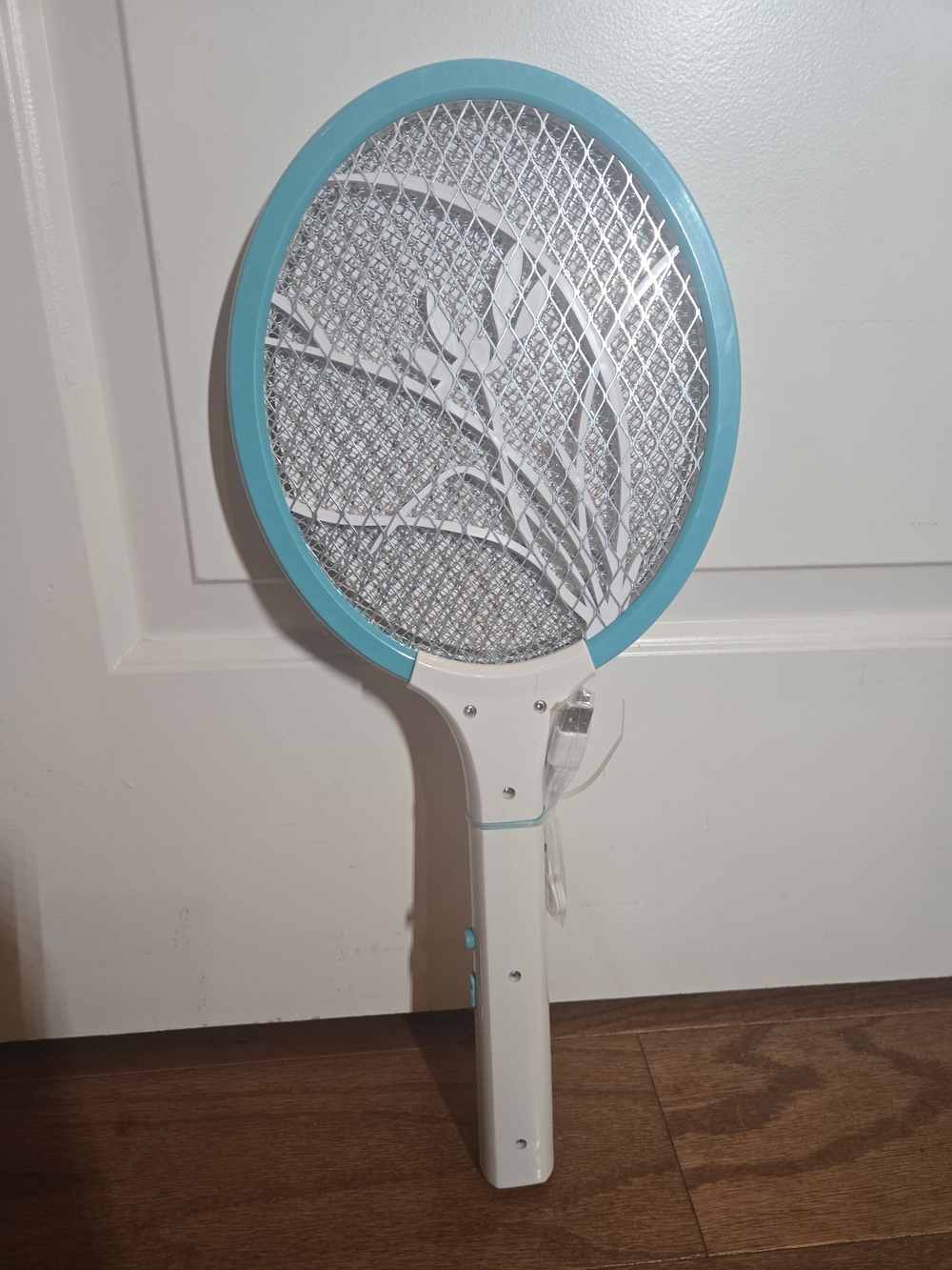 Electric Bug Zapper Racket in Aqua and White